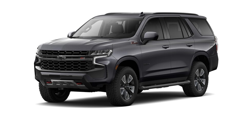Chevrolet Tahoe 2023, SUV con 3 filas de asientos en color gris asfalto metálico